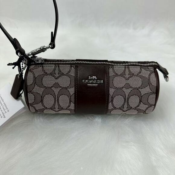 COACH Nolita Barrel Bag Wristlet In Signature Jacquard CU989 Oak Maple NWT - Picture 2 of 6